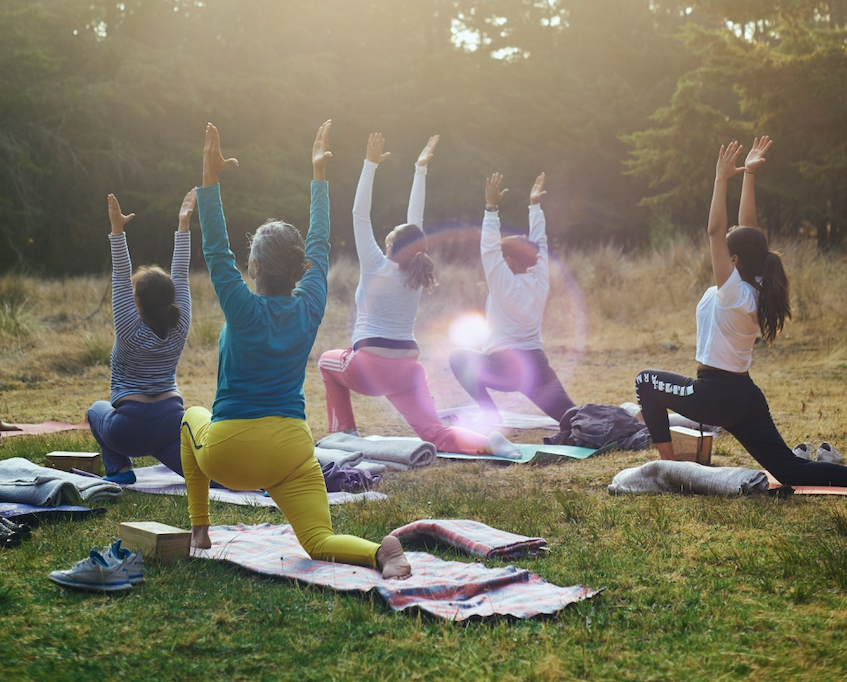 Women doing yoga at an outdoor events venue in mansfield, ohio